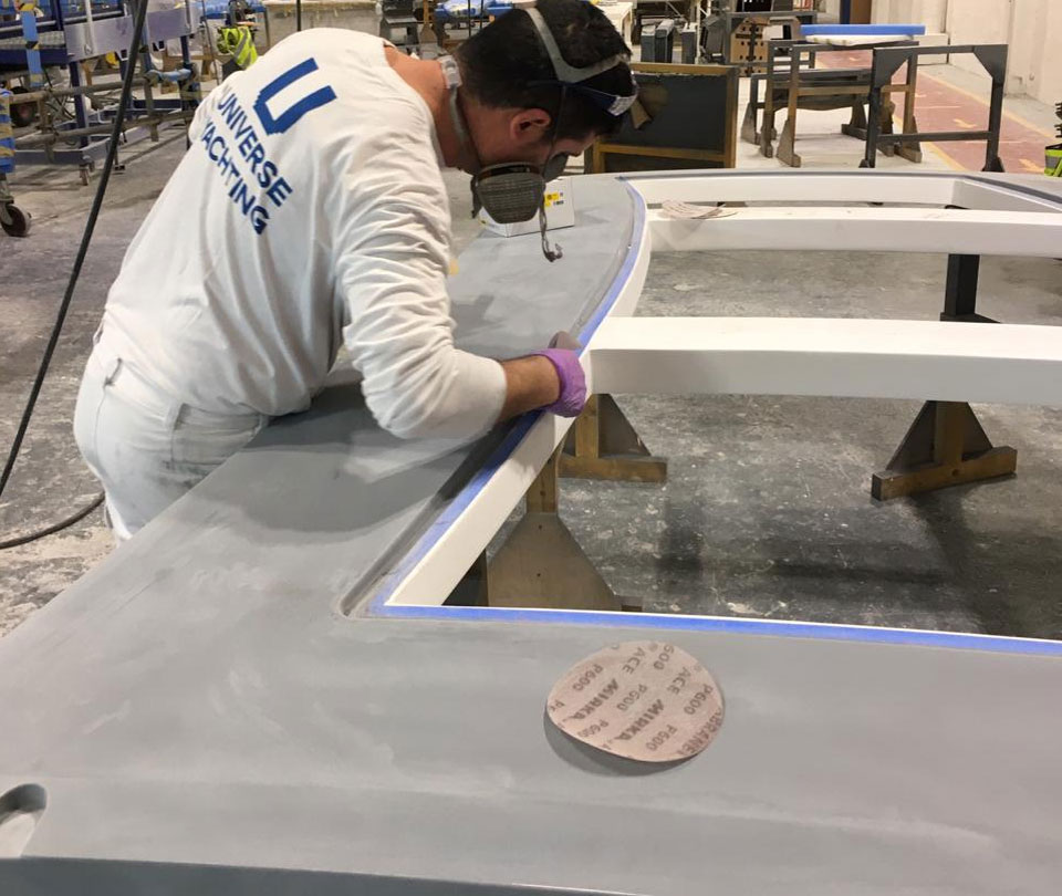 worker fairing surface ready for paint